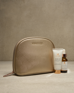 Gold makeup bag with Retinol 0.1% and C E Peptides